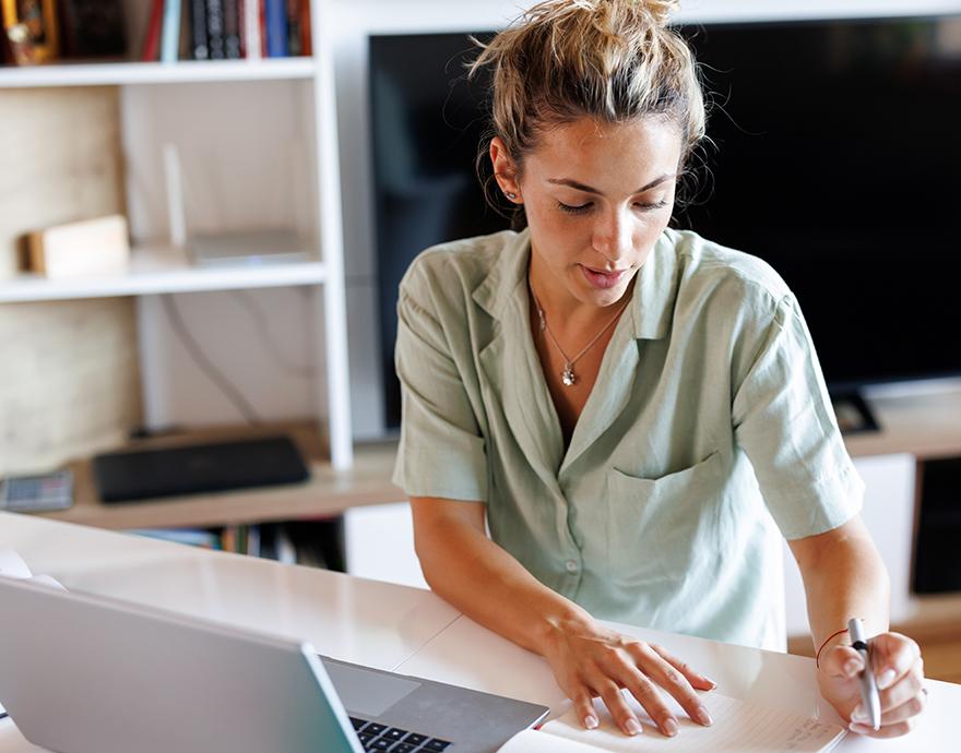 Woman working at a laptop