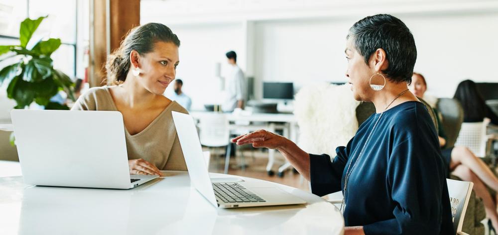 Two women looking at certificate programs available online