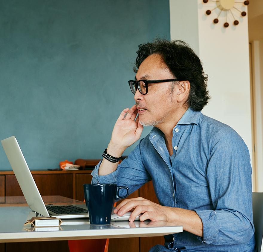 Man sitting at a laptop