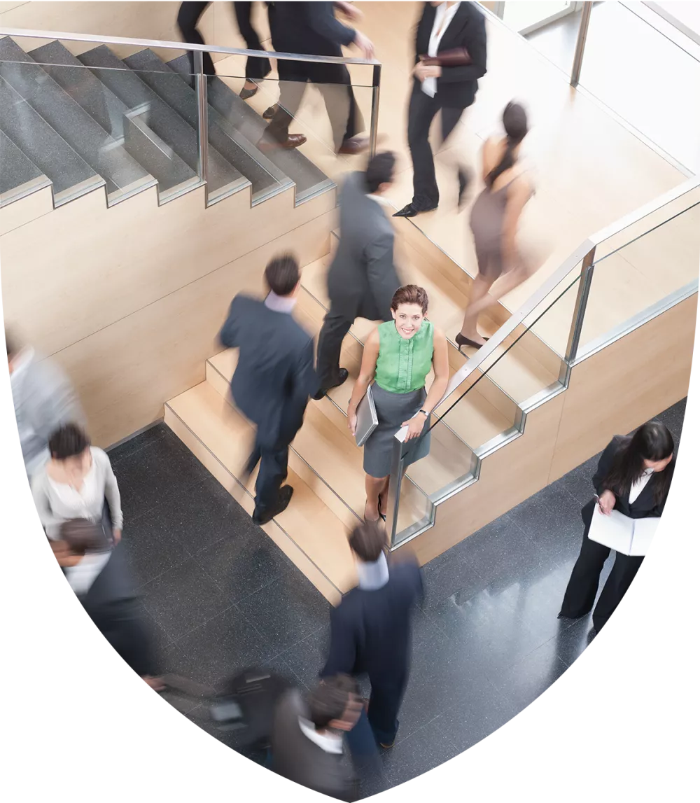 A woman looking up for a set of stairs