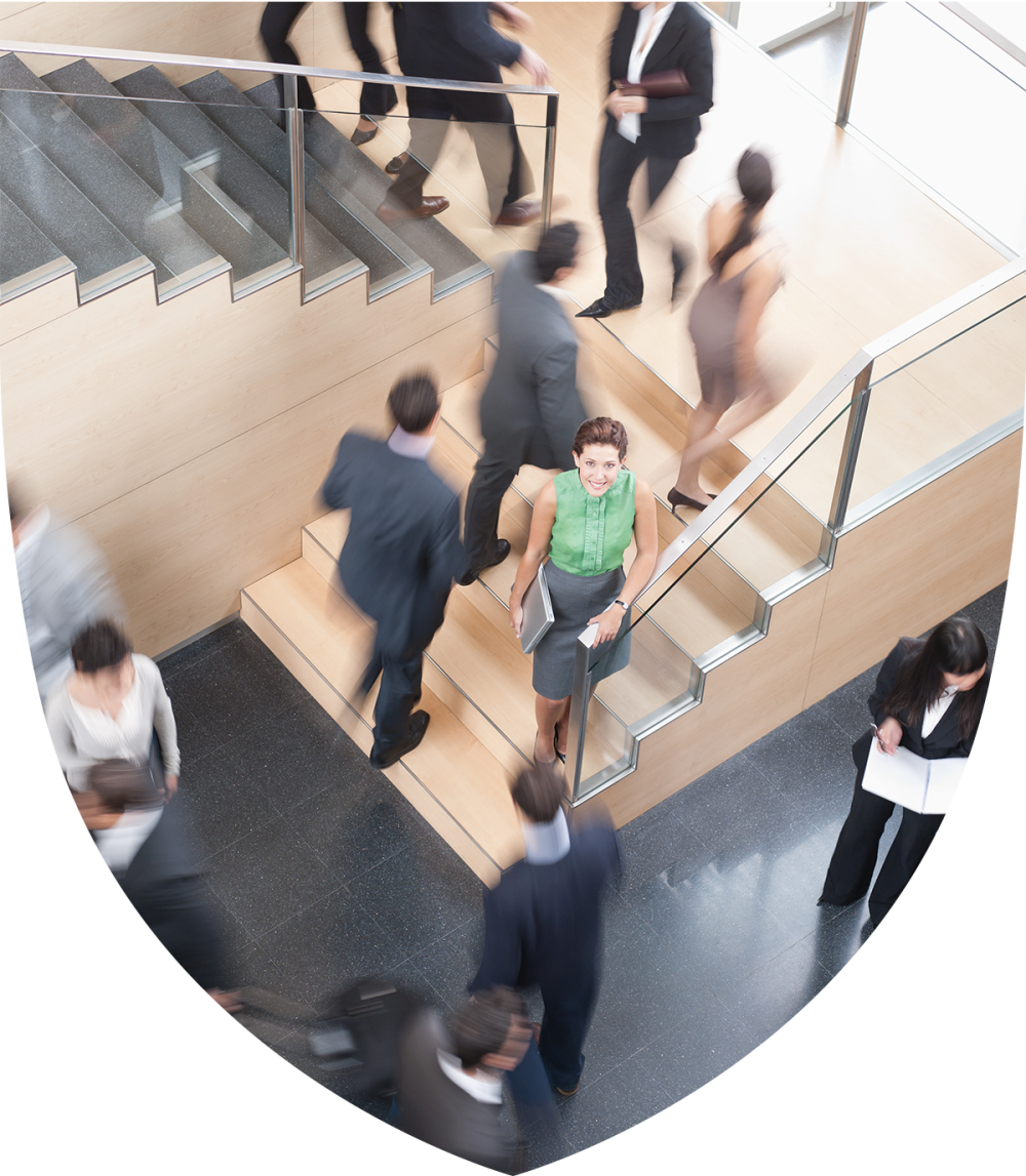 A woman looking up for a set of stairs