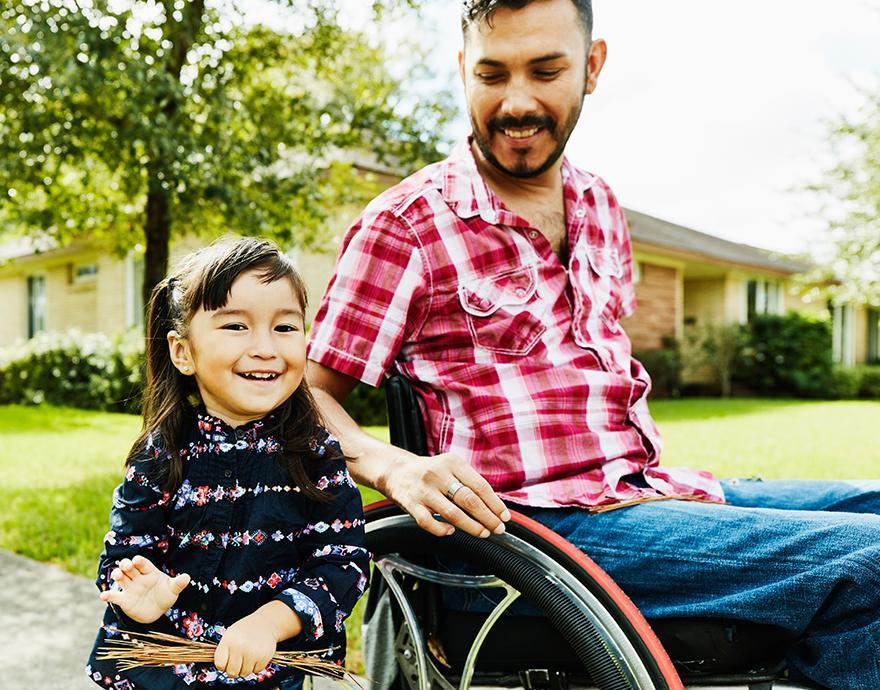 A man next to his daughter