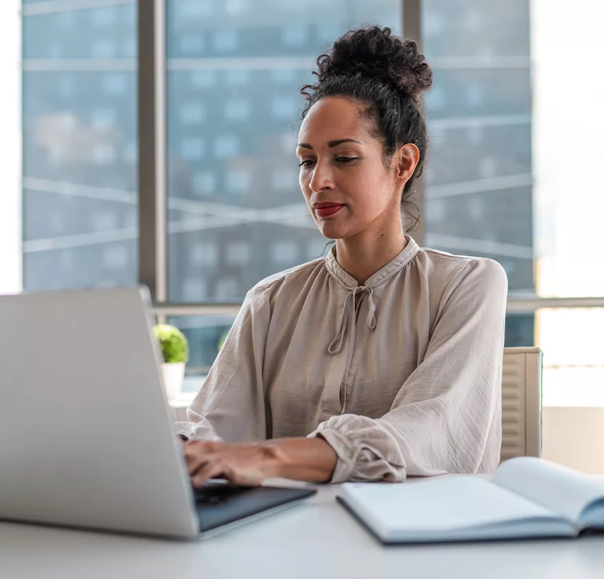 Woman working at a laptop