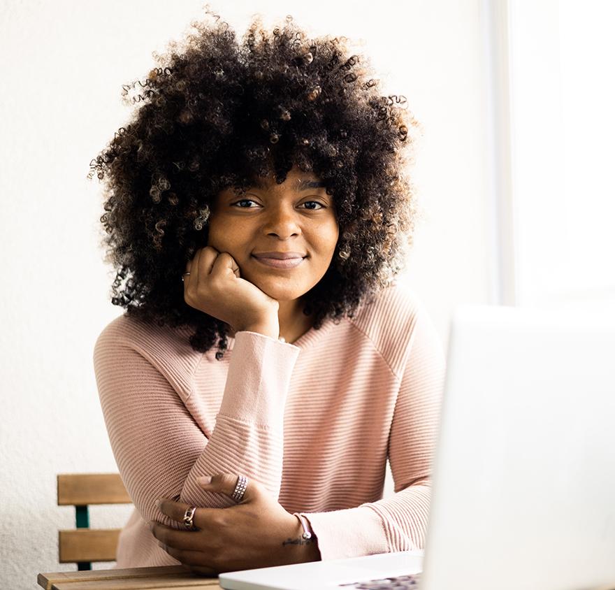 A woman sitting at a desk