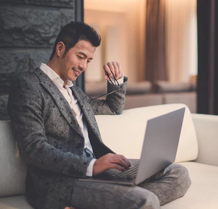 A man working at a laptop