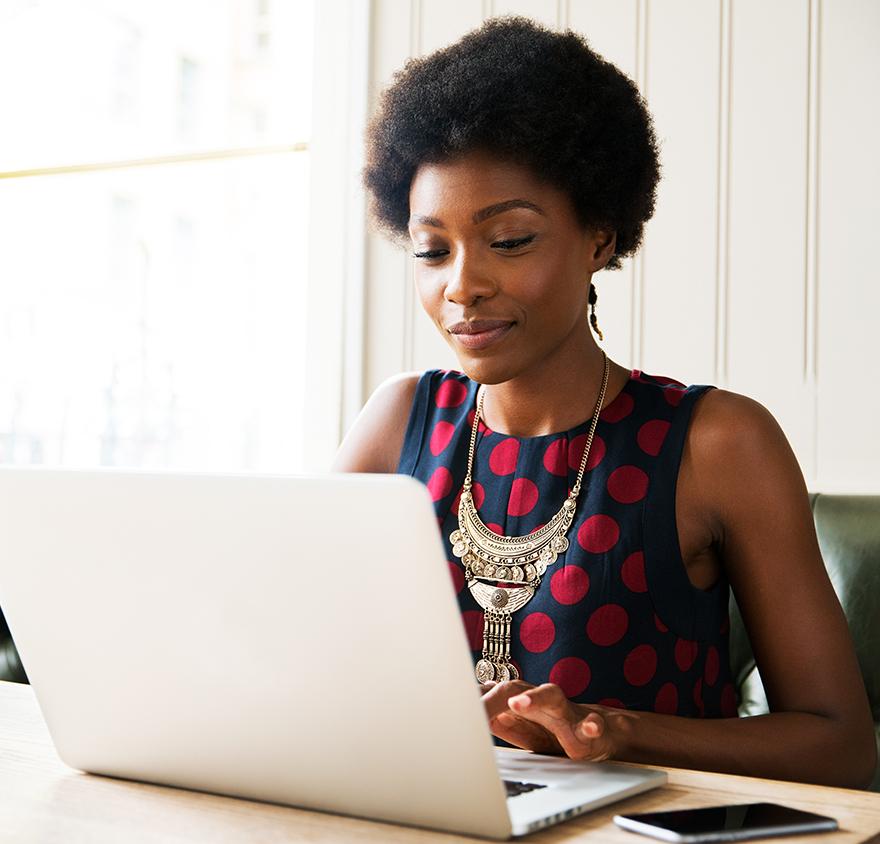 Woman sitting at a laptop