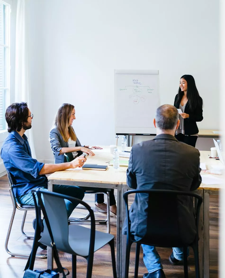 Woman talking to a group meeting 