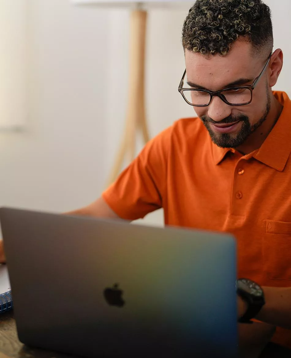 A man working at a laptop