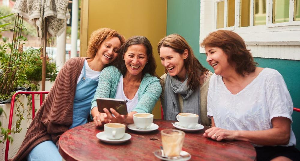 Group of women reading about social security benefits