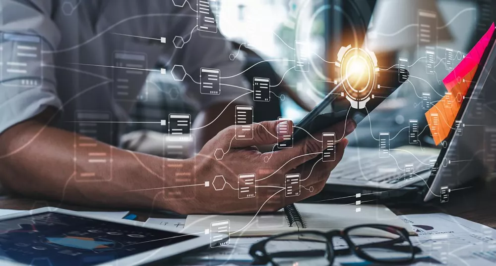 Man working with AI technology at his desk