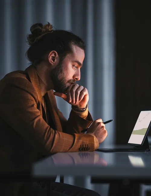 Man looking at a laptop