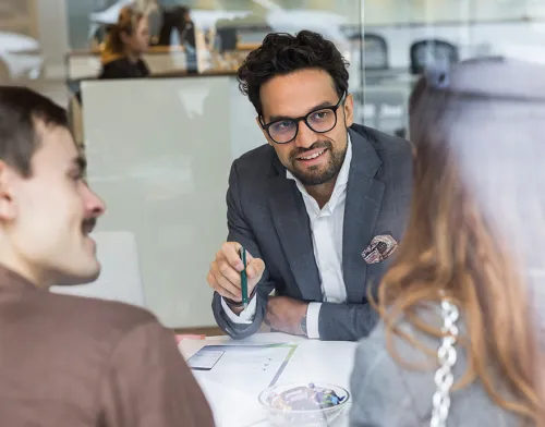 Financial advisor speaking with his clients