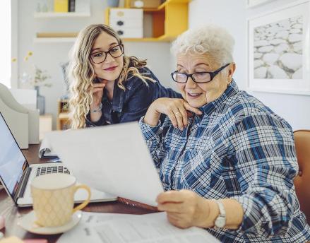 Financial planner working with client at home